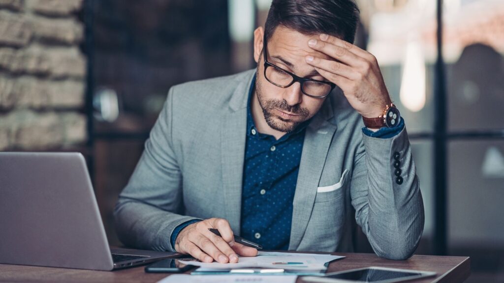 frustrated business person working on marketing his business