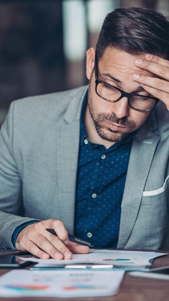 frustrated business person working on marketing his business